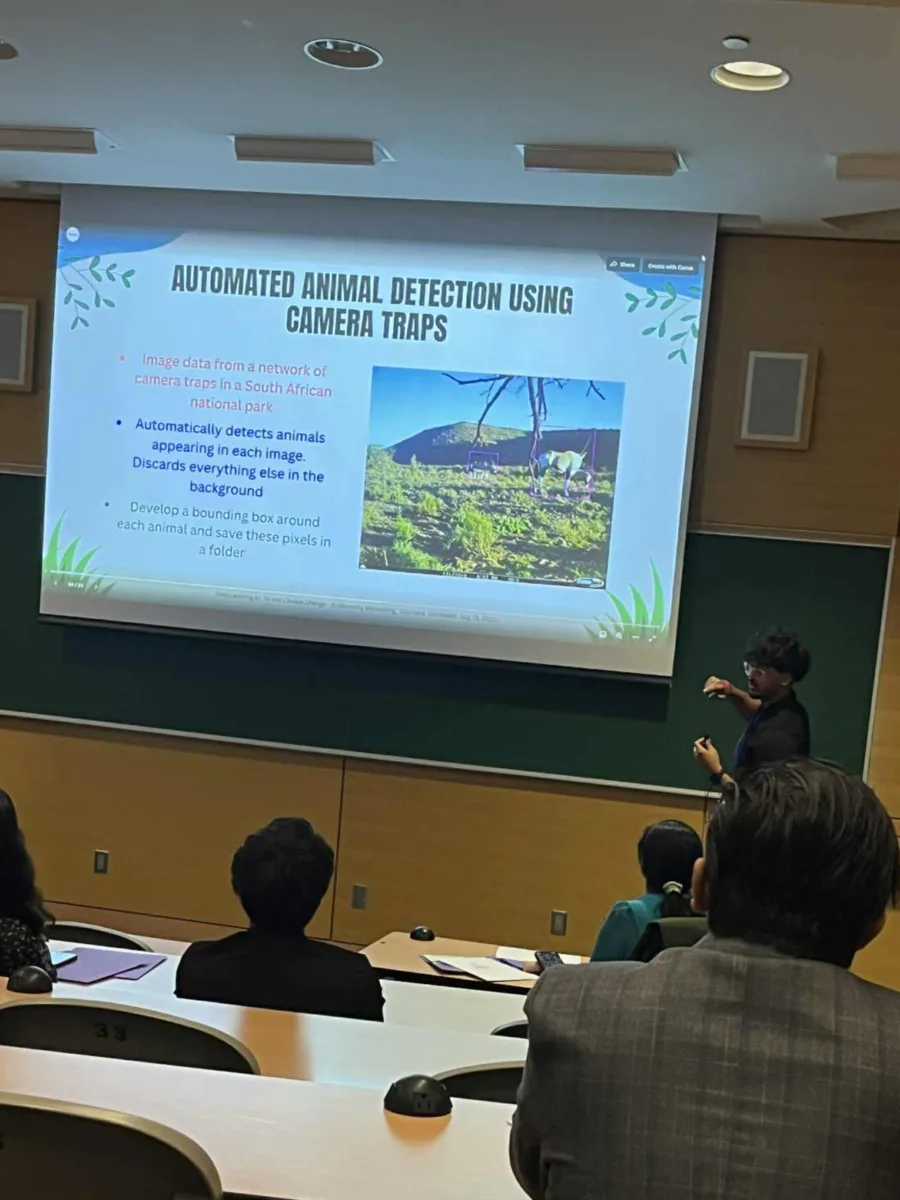 Lance Adhikari presenting work on AI, climate change, and biodiversity at CANEFOR 2025